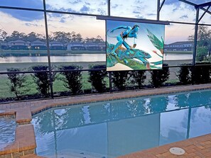 Watch Movies And TV On The Poolside Theater