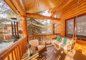 Enjoy your morning coffee on the front porch swing