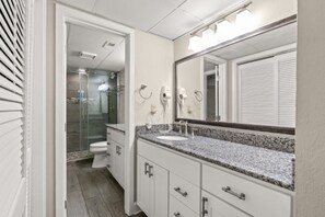 Get ready for a night on the town in this spacious bathroom with double sinks.