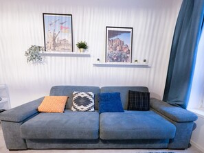 "Bright Elegance: Sofa near the Big Window"