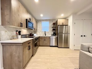 Gather, cook, and enjoy: Our kitchen is the heart of the home.