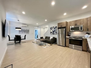 Perfect blend of living, dining, and cooking in our open-concept space.