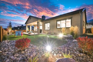 Delight in grilling, putting, games and togetherness in the fully fenced backyard