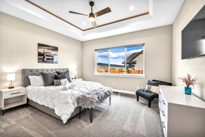 Main Suite with CalKing bed, mountain views and recessed ceiling with dreamy cove lighting. Enjoy your privacy w/ no shared bedroom walls
