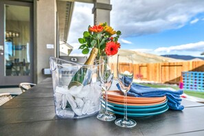 Sit back and relax with a beverage while enjoying mountain views & high desert scenery