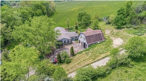 Captivating exterior boasting modern architecture. Landscaped gardens surround the property, enhancing curb appeal. A blend of sophistication and nature welcomes you home.