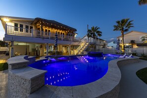 Dive into luxury with a stunning pool and tropical vibes in Galveston!