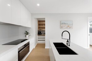 Cook and converse in a spacious modern kitchen