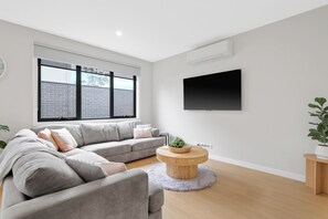 Spacious family room perfect for movie nights