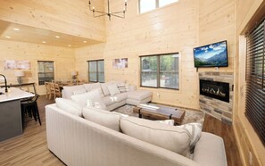 Cozy Living Room with Flat Screen TV and Fireplace