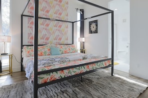 - Bedroom 1 w/ En-suite
- King bed
- 55" Smart TV