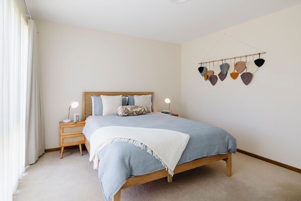 Indulge in ultimate comfort in this queen bedroom with an ensuite bathroom, offering both privacy and style.