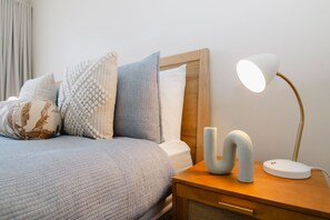 Indulge in ultimate comfort in this queen bedroom with an ensuite bathroom, offering both privacy and style.