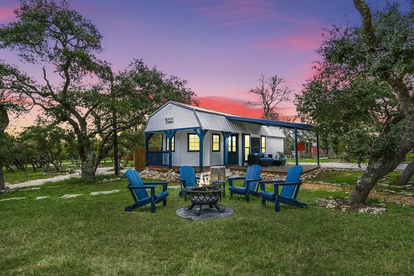 Stardust cottage features a private fire pit and seating area.