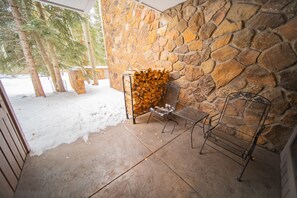 Private patio with firewood