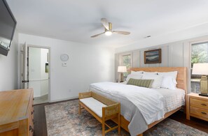 Master bedroom & bathroom with walk in closet and king bed