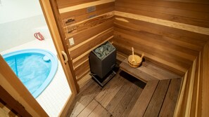 Private sauna and hot tub steps away from the master bedroom.