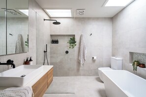 Natural light, quality amenties a heated towel rail and hair dryer are provided.