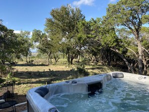 Soak the world away in our seven seat hot tub with a view.
