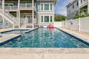 Baydream Believer, a luxurious 7 bedroom, sound front oasis in Corolla. With private dock, pool and hot tub. Perfect family getaway- by Rather Be Properties