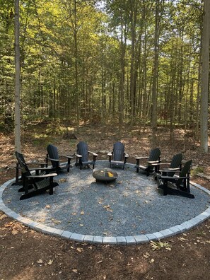 Stainless steel firepit with high quality Polywood Adirondack chairs for 8!