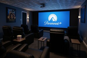 Enjoy your favorite entertainment in a 120" HD theatre room 