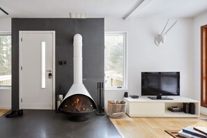 Our Midcentury Modern Malm Fireplace is perfect for warmth and ambiance.