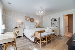 Primary bedroom, queen bed and en-suite bathroom.