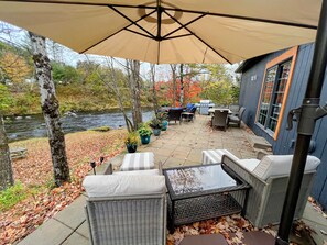 Cozy seating with a breathtaking water view that will leave you in awe!