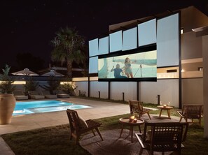 An iconic outdoor cinema set is available, for movie nights pool side. 