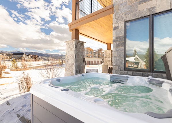 Enjoy the stunning mountain views from our private hot tub!