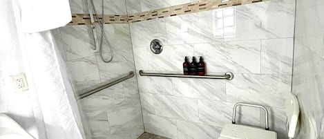 Bathroom includes: Shampoo, Conditioner, Body soap , hand soap, hand towel, toilet paper.