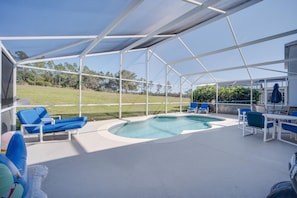Large pool deck with fairway views