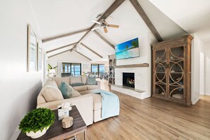 Kick back with coastal charm, cozy seating, and a Gulf breeze through every room