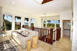 Upstairs Living Room with Smart TV and Half Bath.