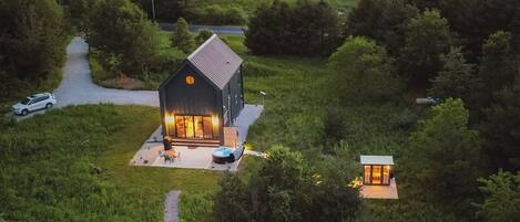 The hot tub and infrared sauna are secluded and overlook the private meadow