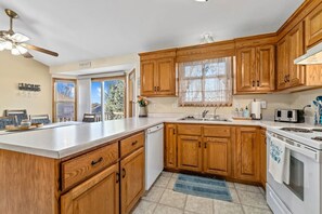 Fully equipped kitchen with ample counter space.