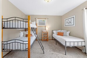 Perfect for families, this room features comfy bunk beds.