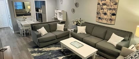 Spacious living area with queen sleeper sofa