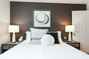 Queen bed with 43 inch smart tv