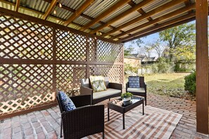 Relish in the comfort of an outdoor setting designed for ultimate relaxation, where comfortable furnishings harmonize with the natural ambiance, offering a tranquil oasis for unwinding amidst the beauty of nature.