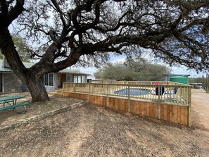 Private pool and deck next to the ranch house