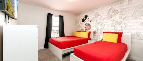 Our lovely vacation home has 4 bedrooms, 2 masters with king and queen beds, and two bedrooms for kids with a single and a full beds. The Mickey themed bedrooms is a dream come true for the little ones.You have FREE access to the water park!