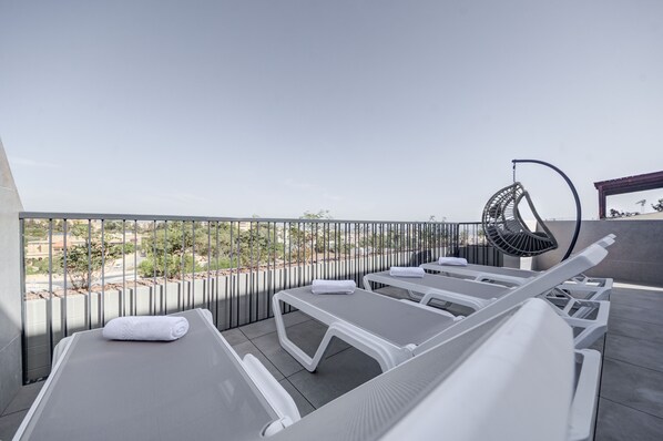 Marvel at the magnificent views while sipping a refreshing cocktail