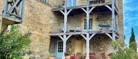 View of Maison Delluc with its double balconies offering stunning vistas