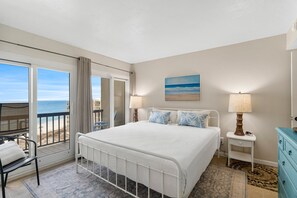 King Size bed with a private balcony and breathtaking gulf views.