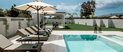 Sophisticated pool surroundings offering a sense of tranquility. 