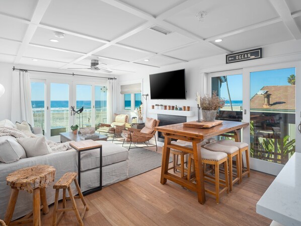 This luminous open-plan Living space showcases contemporary design and generous seating, complete with a stylish Dining area.