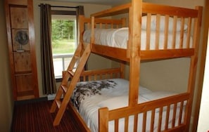 The cozy single over double bunk bed is perfect for the kids or the kids at heart!