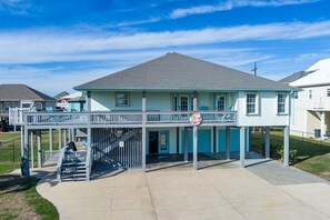 House has a cargo lift an parking for up to 11 vehicles.